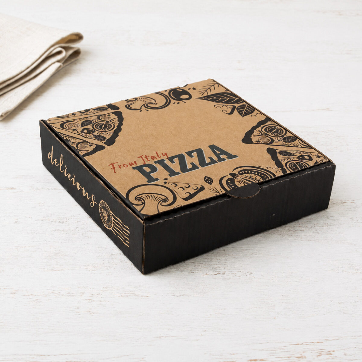 Kraft pizza box with black sides and From Italy Pizza artwork on a white tabletop