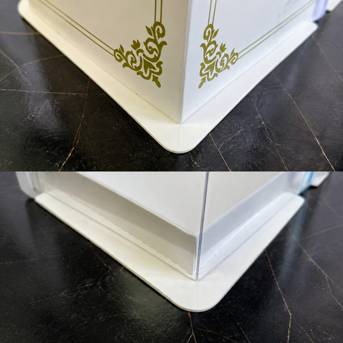 White and clear cake box corner details with gold decoration and a rounded base flange